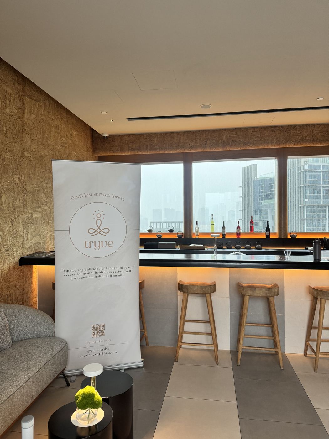 The Tryve banner standing in an empty lounge before guests arrive
